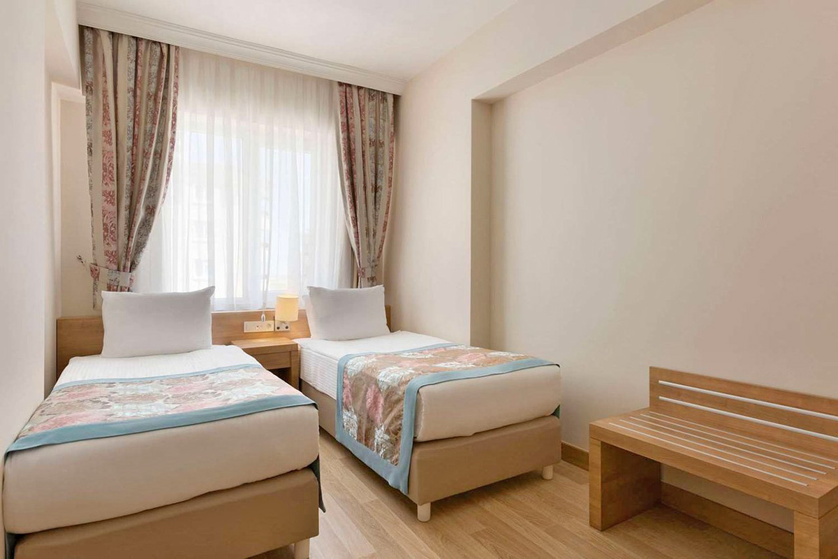 ramada resort lara twin bedroom