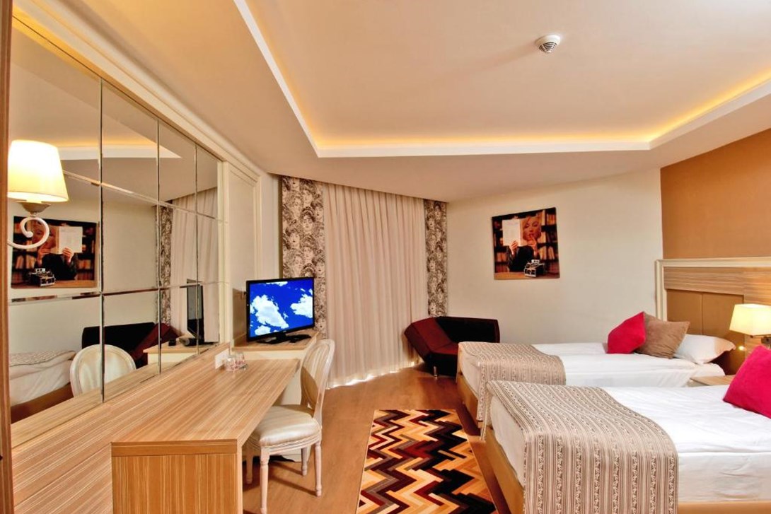 Hotel Room With Side Sea View Bedroom Delphin Deluxe Resort
